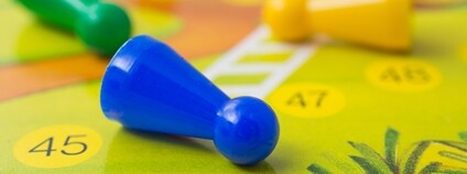 Figurky na deskové hře Foto: Depositphotos