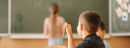 Žáci ve třídě Foto: Depositphotos