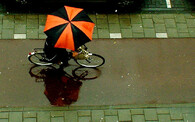 cyklista v dešti