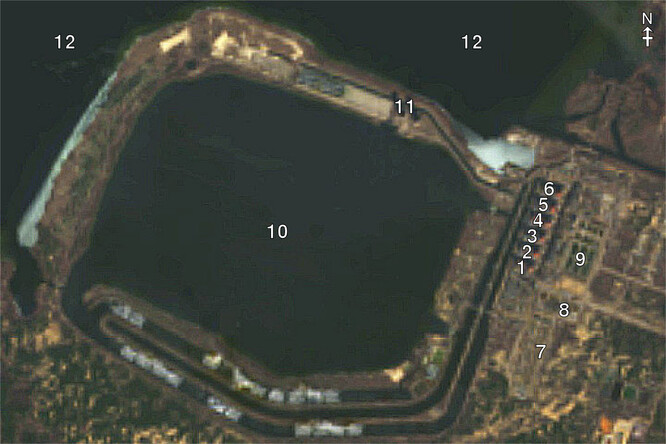 Satelitní fotografie Záporožské jaderné elektrárny z USGS LandsatLook
    1–6. Reaktorové bloky 1–6
     7. Elektrické stožáry
     8. Cvičné budovy
     9. Skladování radioaktivních odpadů
     10. Chladící jezero
     11. Chladicí věže
     12. Vodní nádrž Kachovka